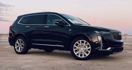 Black Cadillac XT6 luxury executive SUV for professional chauffeur and livery services