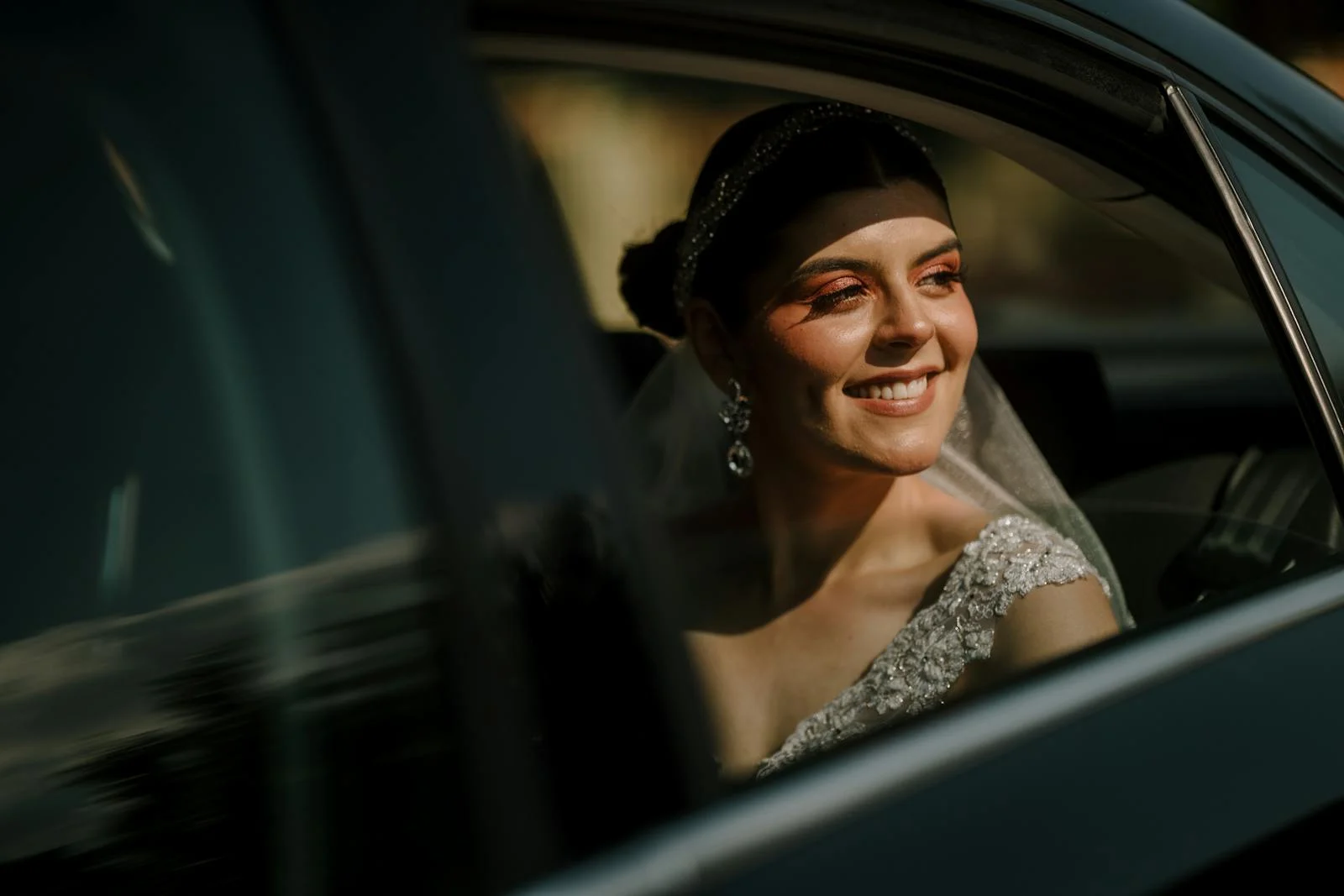 Bride inside luxury limousine