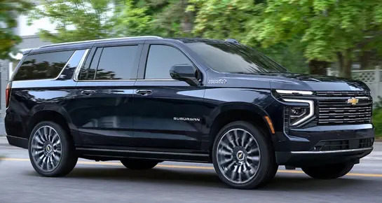 Front view of a premium Chevrolet Suburban SUV, ideal for family travel and corporate airport transfers