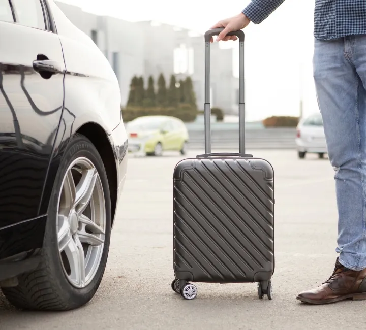 bnl airport transfers 16 Professional chauffeur inside a premium black car