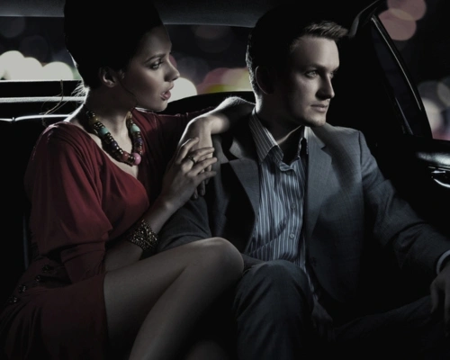 couple in limousine for night out