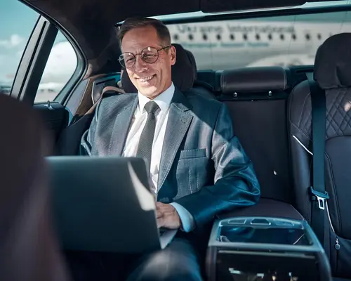 Executive airport transfers for business travelers at Logan
